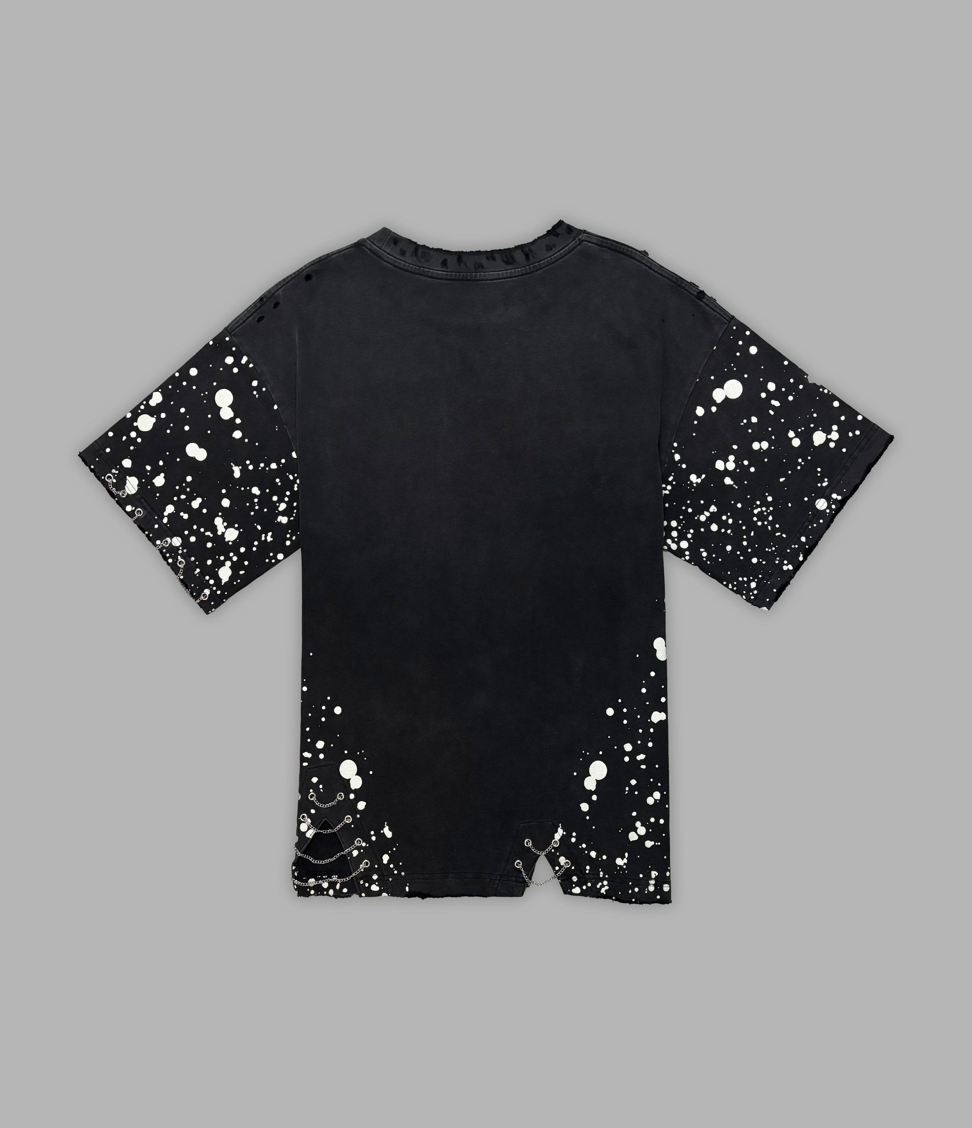 Black t-shirt with white splatter pattern on a gray background